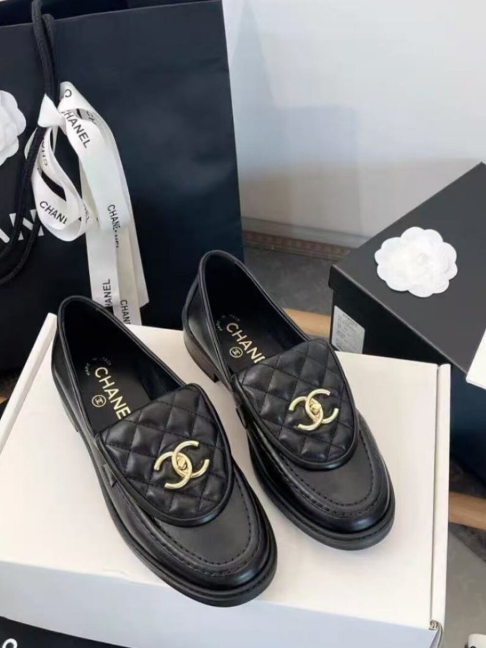 CHANEL black flap loafers